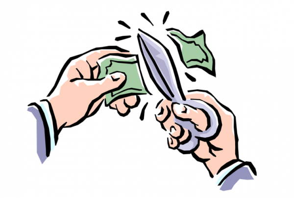 scissors cutting money