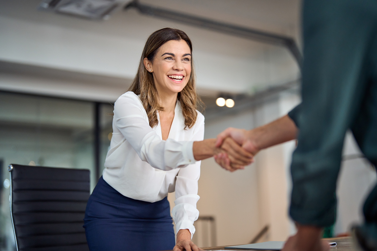 Business professionals discussing a project